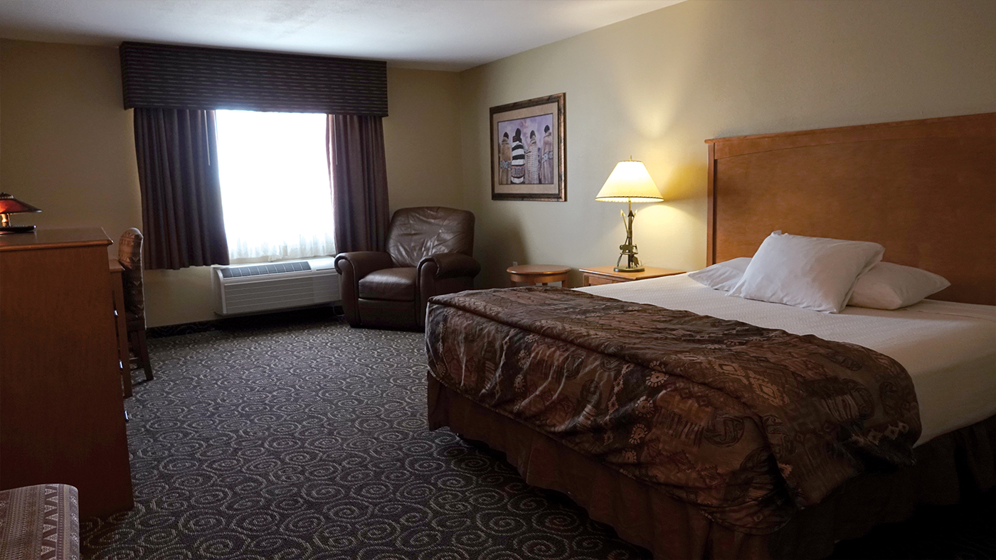 King bed hotel room at Prairie Wind Casino & Hotel